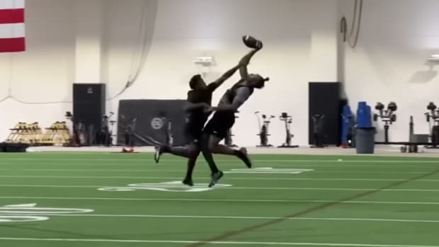 Buffs receiver Javon Antonio makes a one-handed grab over defensive back in practice on June 13, 2023